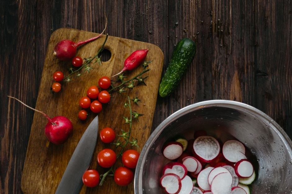 Fresh vegetables prepared on a wooden table